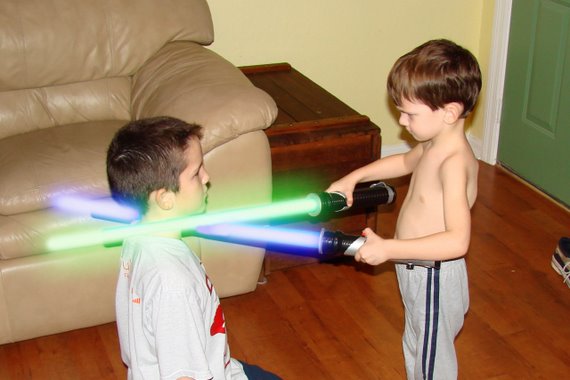 Kid Attempts to Behead Brother with Dual Lightsabers!